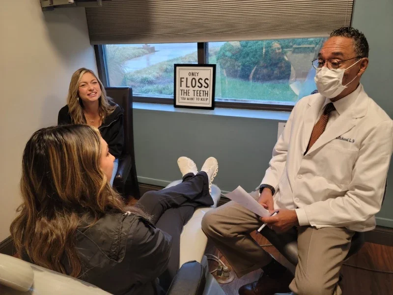 Photo of Doctor Having a Conversation with Patient